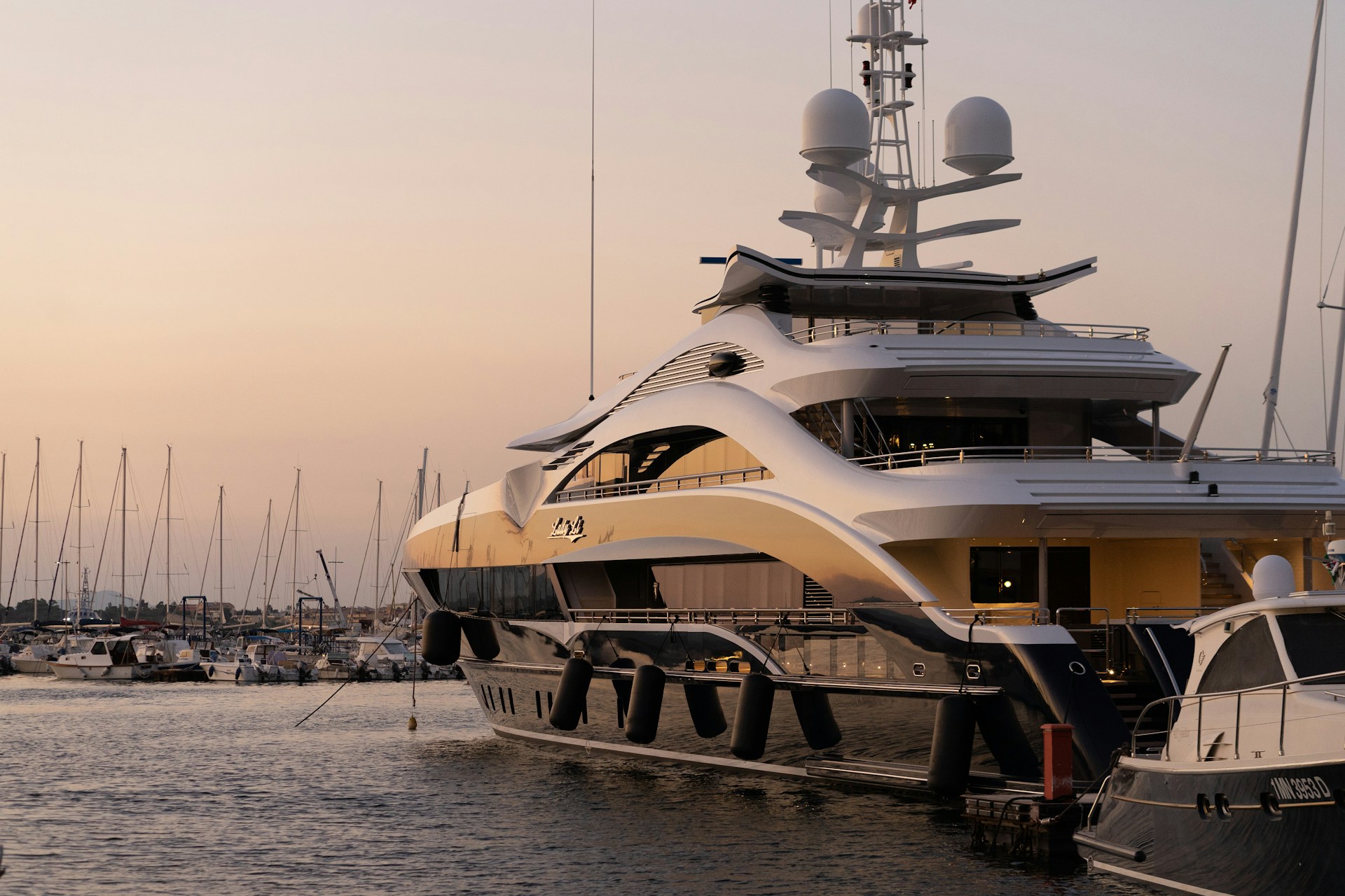 Superyacht at anchor at golden hour